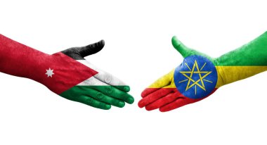 Etiyopya ve Ürdün bayrakları arasındaki el sıkışma ellere boyanmış, izole şeffaf görüntü.