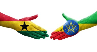 Etiyopya ve Gana bayrakları arasındaki el sıkışma ellerinde izole şeffaf görüntü.