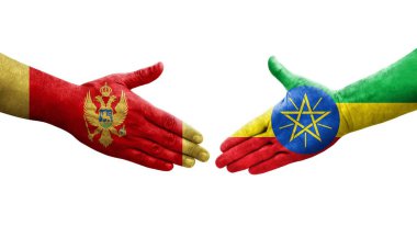 Etiyopya ile Karadağ bayrakları arasındaki el sıkışma, izole edilmiş şeffaf görüntü.