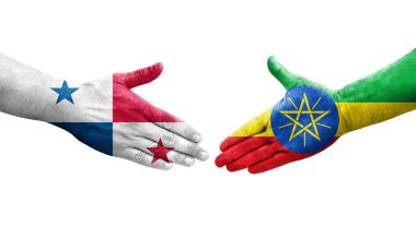 Etiyopya ve Panama bayrakları arasındaki tokalaşma elleri boyalı, izole şeffaf görüntü.