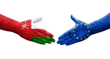 Avrupa Birliği ile Umman bayrakları arasındaki el sıkışma, izole şeffaf görüntü.