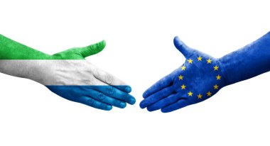 Avrupa Birliği ile Sierra Leone bayrakları arasındaki el sıkışma, izole şeffaf görüntü.