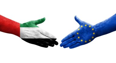 Avrupa Birliği ile BAE bayrakları arasındaki el sıkışma, izole şeffaf görüntü.