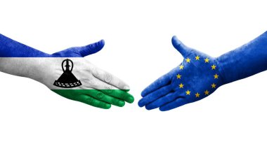 Avrupa Birliği ile Lesotho bayrakları arasındaki el sıkışma, izole şeffaf görüntü.