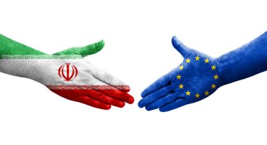 Avrupa Birliği ve İran bayrakları arasındaki el sıkışma, izole şeffaf görüntü.