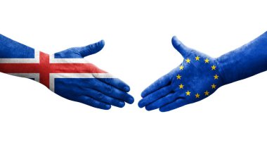 Avrupa Birliği ile İzlanda bayrakları arasındaki el sıkışma, izole şeffaf görüntü.
