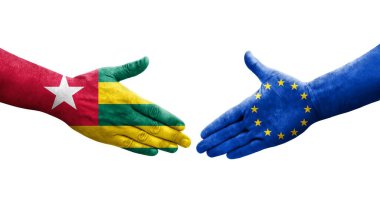 Avrupa Birliği ile Togo bayrakları arasındaki el sıkışma, izole şeffaf görüntü.