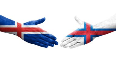Faroe Adaları ve İzlanda bayrakları arasındaki el sıkışma, izole şeffaf görüntü.