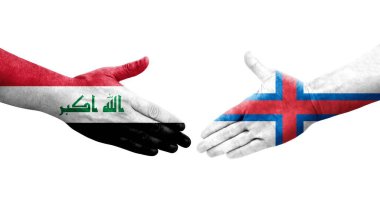 Faroe Adaları ile Irak bayrakları arasındaki el sıkışma, izole edilmiş şeffaf görüntü.