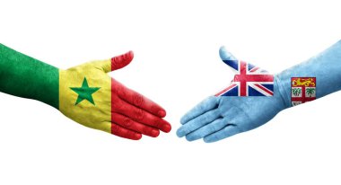 Fiji ve Senegal bayrakları arasındaki el sıkışma, izole şeffaf görüntü.