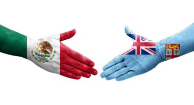 Fiji ve Meksika bayrakları arasındaki el sıkışma ellerinde resmedilmiş şeffaf bir görüntü..