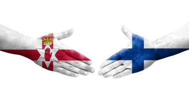 Finlandiya ve Kuzey İrlanda bayrakları arasındaki el sıkışma el yazısı, izole edilmiş şeffaf görüntü.