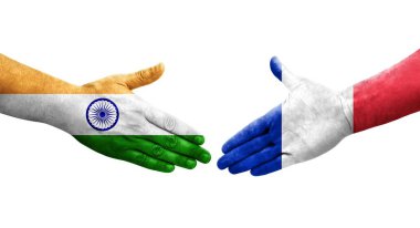 Fransa ve Hindistan arasındaki el sıkışma ellerinde bayraklar, izole şeffaf görüntü.