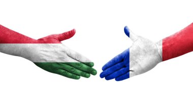 Fransa ve Macaristan bayrakları arasındaki el sıkışma, izole şeffaf görüntü.