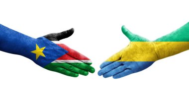Gabon ve Güney Sudan bayrakları arasında el sıkışma..