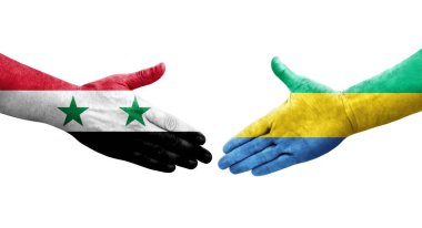 Gabon ve Suriye bayrakları arasında el sıkışma, izole şeffaf görüntü.