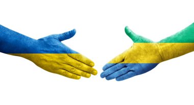Gabon ve Ukrayna bayrakları arasında el sıkışma, izole şeffaf görüntü.