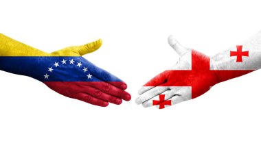 Gürcistan ve Venezuela bayrakları arasındaki tokalaşma ellerinde şeffaf bir görüntü.