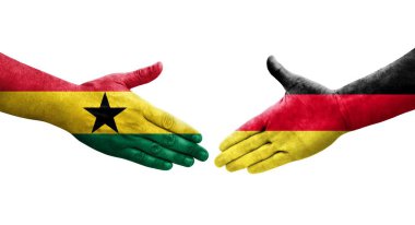 Almanya ile Gana bayrakları arasındaki el sıkışma, izole edilmiş şeffaf görüntü.