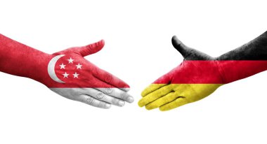 Almanya ve Singapur bayrakları arasında el sıkışma, izole saydam görüntü.