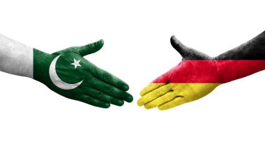 Almanya ve Pakistan bayrakları arasında el sıkışma, izole şeffaf görüntü.