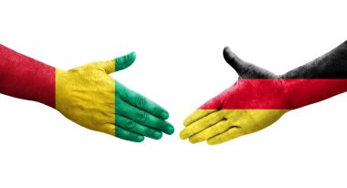 Almanya ile Gine bayrakları arasındaki el sıkışma, izole şeffaf görüntü.