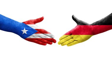 Almanya ile Porto Riko bayrakları arasında el sıkışma, izole şeffaf görüntü.