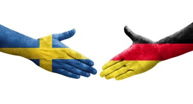 Almanya ve İsveç bayrakları arasında el sıkışma, izole şeffaf görüntü.