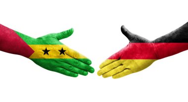 Almanya ile Sao Tome ve Principe bayrakları arasındaki el sıkışma, izole şeffaf görüntü.