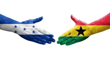 Gana ve Honduras bayrakları arasındaki el sıkışma ellerinde resmedilmiş şeffaf görüntü.