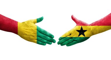 Gana ve Gine bayrakları arasındaki el sıkışma ellerinde resmedilmiş şeffaf görüntü.
