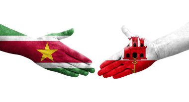 Cebelitarık ile Surinam bayrakları arasında el sıkışma, izole şeffaf görüntü.