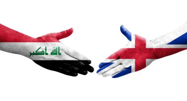 Büyük Britanya ve Irak bayrakları arasındaki el sıkışma, izole şeffaf görüntü.