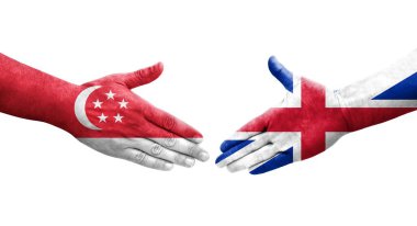 Büyük Britanya ve Singapur bayrakları arasındaki el sıkışma ellere boyanmış, izole şeffaf görüntü.