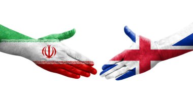 Büyük Britanya ve İran bayrakları arasındaki el sıkışma, izole şeffaf görüntü.