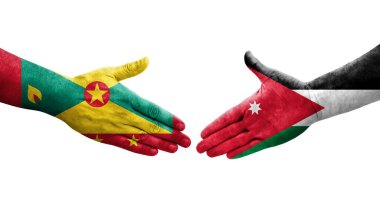 Grenada ve Ürdün bayrakları arasındaki el sıkışma ellere boyanmış, izole şeffaf görüntü.