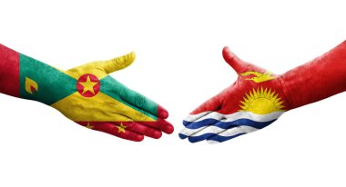 Grenada ve Kiribati bayrakları arasındaki el sıkışma ellerinde izole şeffaf görüntü.