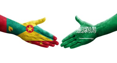 Grenada ve Suudi Arabistan bayrakları arasındaki el sıkışma, izole şeffaf görüntü.