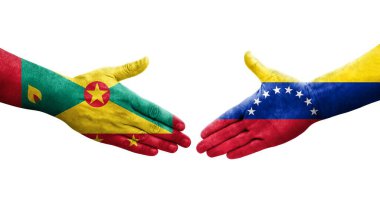 Grenada ve Venezuela bayrakları arasındaki el sıkışma ellerinde resmedilmiş şeffaf görüntü.