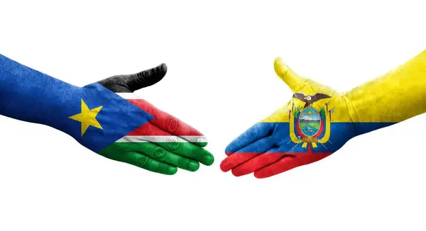 Stock image Handshake between Ecuador and South Sudan flags painted on hands, isolated transparent image.