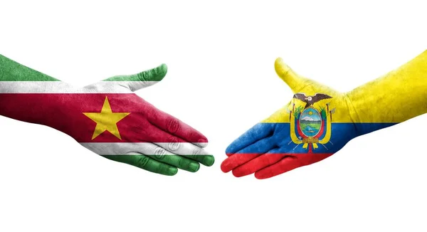 stock image Handshake between Ecuador and Suriname flags painted on hands, isolated transparent image.