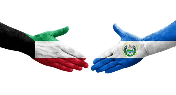 stock image Handshake between El Salvador and Kuwait flags painted on hands, isolated transparent image.