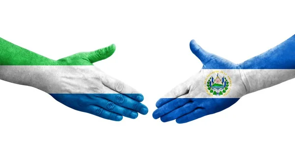 Handshake Entre Salvador Serra Leoa Bandeiras Pintadas Mãos Imagem Transparente — Fotografia de Stock