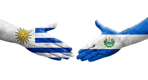 Handslag Mellan Salvador Och Uruguay Flaggor Målade Händer Isolerad Transparent — Stockfoto