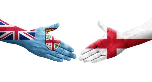 Handdruk Tussen Engeland Fiji Vlaggen Geschilderd Handen Geïsoleerd Transparant Beeld — Stockfoto