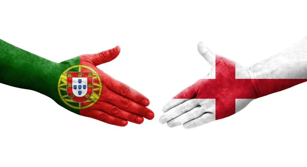 手に描かれたイギリスとポルトガルの旗の間の握手 隔離された透明なイメージ — ストック写真