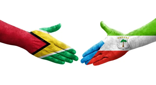 Рукостискання Між Екваторіальною Гвінеєю Прапорами Гаяни Намальоване Руках Ізольоване Прозоре — стокове фото