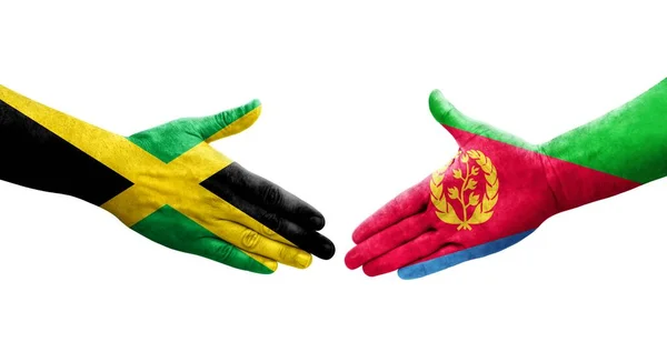 Eritre Jamaika Bayrakları Arasındaki Sıkışma Ellerinde Resmedilmiş Şeffaf Görüntü — Stok fotoğraf