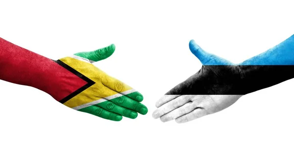 Stretta Mano Tra Estonia Guyana Bandiere Dipinte Mani Isolata Immagine — Foto Stock