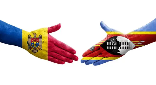 stock image Handshake between Eswatini and Moldova flags painted on hands, isolated transparent image.